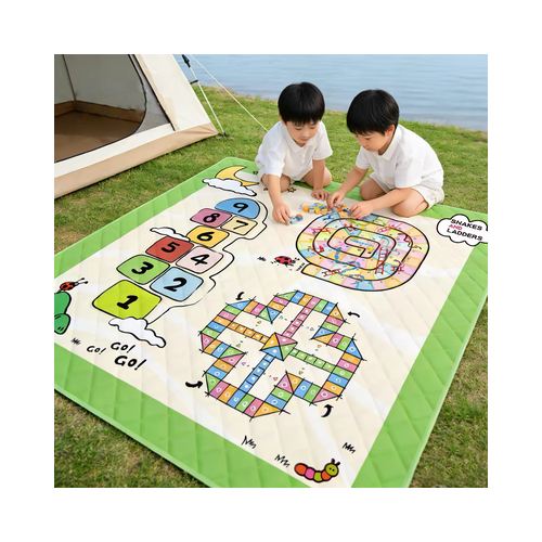 Two children playing on the custom 3-in-1 games picnic mat printed with snakes and ladders, hopscotch and ludo