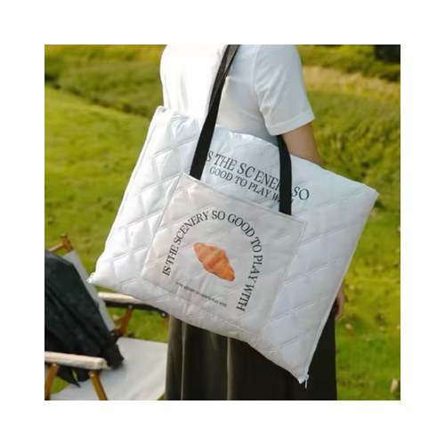 Custom 2-in-1 Picnic Mat Tote Bag Shoulder Carry Custom 2-in-1 picnic mat tote bag folded and carried over the shoulder with a printed logo panel