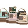 Custom Retro Radio Bluetooth Speaker Colour Range in Mint Green Pink Black and Cream Custom Retro Radio Bluetooth Speaker shown in mint green, forest green, pink, black and cream colourways