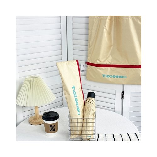 Custom Umbrella Tote Bag in Beige with Zip Sleeve and Folding Umbrella in Singapore Beige custom umbrella tote bag showing the zip sleeve unfolded into a tote bag beside the folding umbrella, Singapore