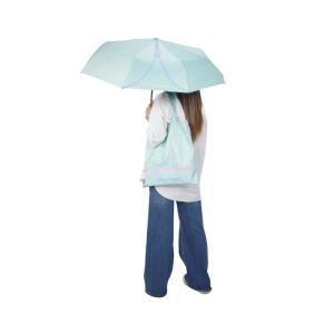 Custom umbrella tote bag in mint green carried as a shoulder tote with the folding umbrella open, Singapore
