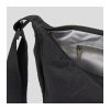 Open view of the lined interior and internal zip pocket of a crescent crossbody bag, Singapore