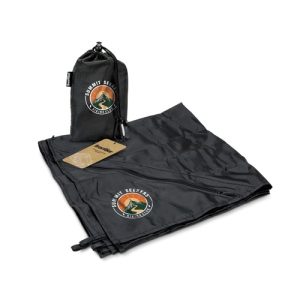 Print mock-up showing a sample roundel logo on a water resistant camping blanket and its pouch, Singapore