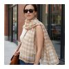 A custom printed lightweight scarf worn draped over the shoulders outdoors, Singapore