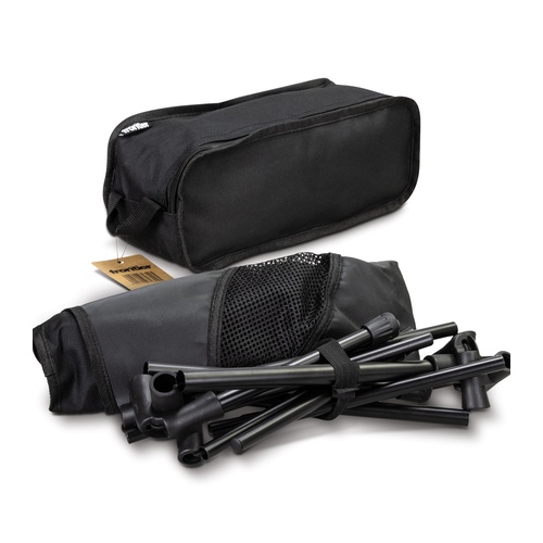 Folding chair broken down into its shock corded poles and seat, packed beside the carry bag, Singapore