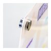 Close view of a stainless steel corner magnet cap holding the acrylic planner panel in place, Singapore