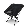 Lightweight folding camp chair set up, with a low black seat on a slim alloy frame, Singapore