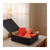 Custom Magnetic Gift Box, Large Rigid Box in Matt Black 12 Black magnetic gift box open on a table filled with wrapped gifts and shredded paper, Singapore