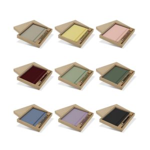Nine colourways of an A5 notebook and pen gift set presented in kraft gift boxes, Singapore
