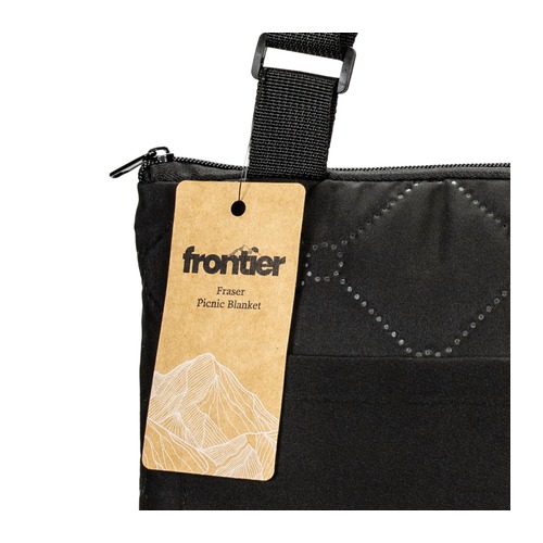 Custom Picnic Blanket, Quilted and Water Resistant with Carry Strap 5 Close view of the zipped front pocket, webbing carry strap and Frontier hangtag on the picnic blanket, Singapore