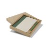 Custom Recycled Notebook and Pen Set, Sugarcane Paper with RPET Trim 9 Sugarcane paper notebook with green RPET spine trim and matching pen in an open kraft gift box, Singapore