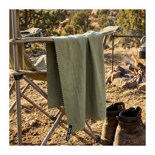 Custom Travel Towel, Rapid Dry Microfibre with Roll-Top Dry Bag 6 Rapid dry towel hung over a camp chair to dry at a campsite, Singapore